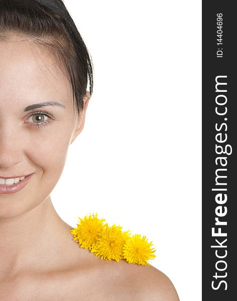 Three yellow flowers on shoulder at woman isolated In white