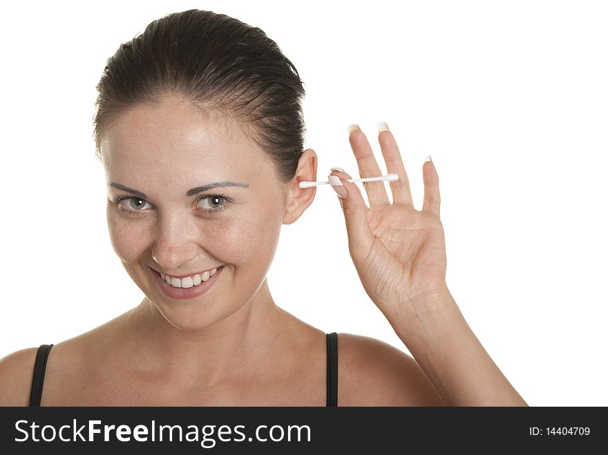 Smiling woman cleans ears cotton buds isolated in white