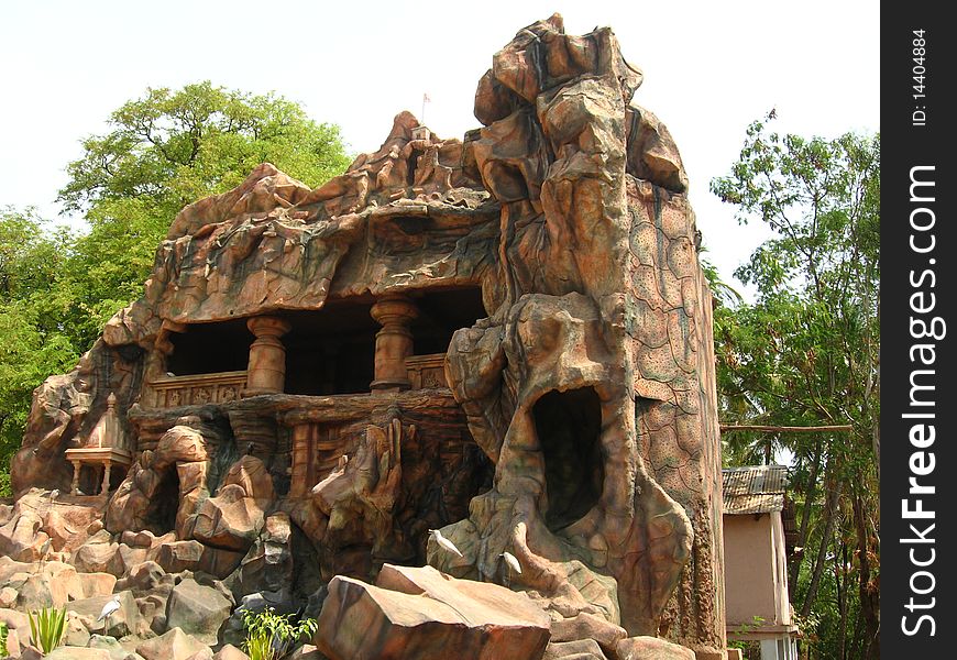 A beautiful and ancient cave with small Indian temple. A beautiful and ancient cave with small Indian temple.