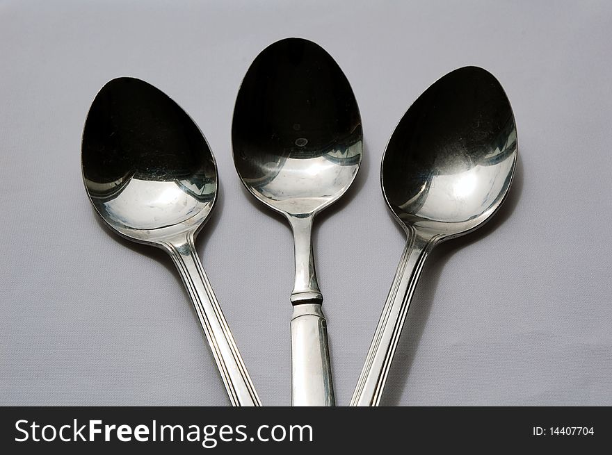 Close up of three spoon with white background
