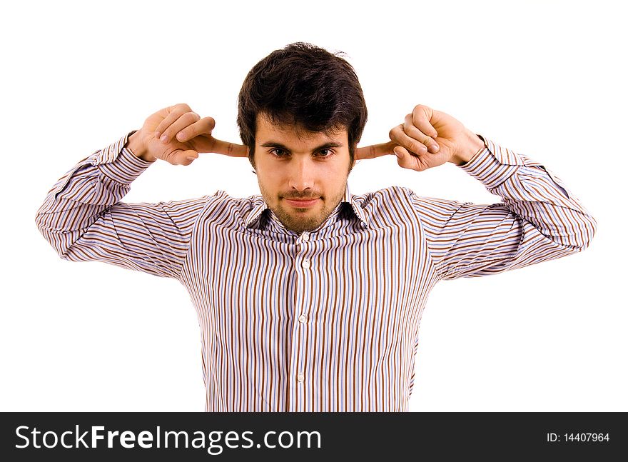 Young man with fingers in ears isolated on white