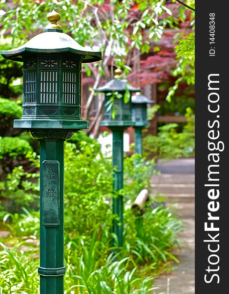 A row of lanterns in a Shinto Temple