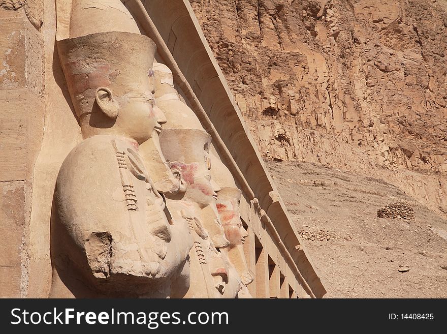 Three ancient statues in Hatshepsut's temple in Egypt. Three ancient statues in Hatshepsut's temple in Egypt