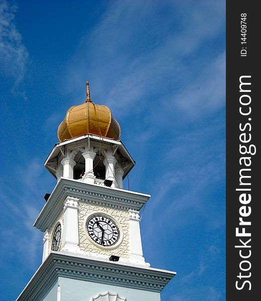 The Clock tower under blue sky