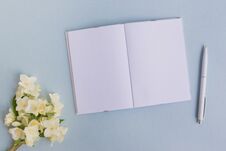 Mockup Notebook With White Jasmine Flowers Stock Photos