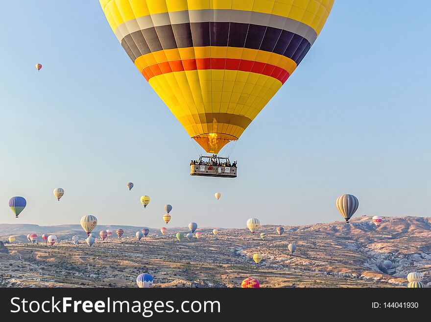 Hot air balloon in blue sky in Goreme Cappadocia