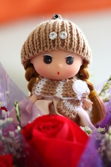 Rose And Doll Stock Photo