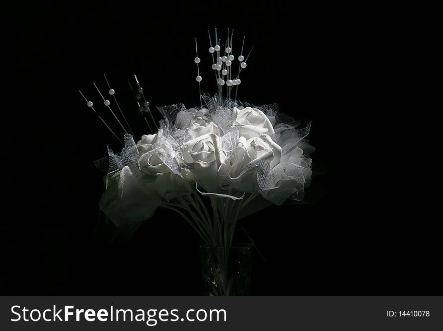 Bouquet in a vase against a dark background