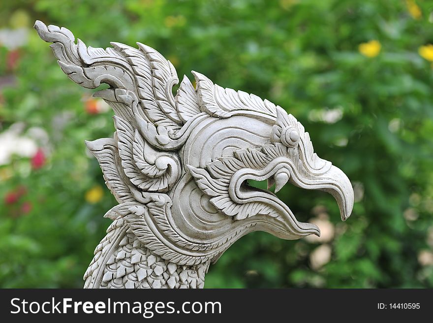 The sculpture detail of white Thai griffin head