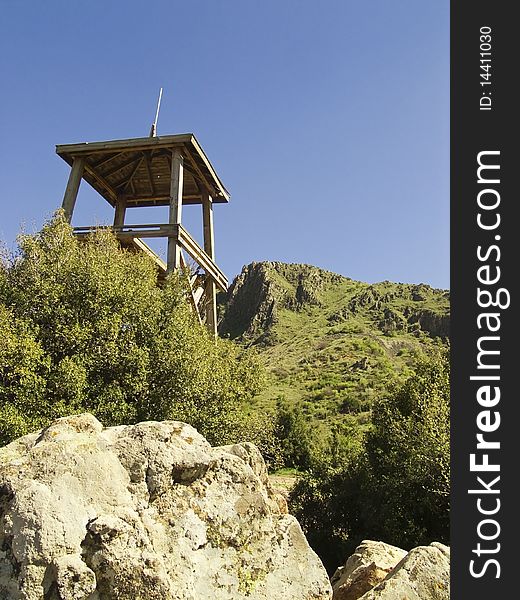 Blue sky and very old Forest fire tower