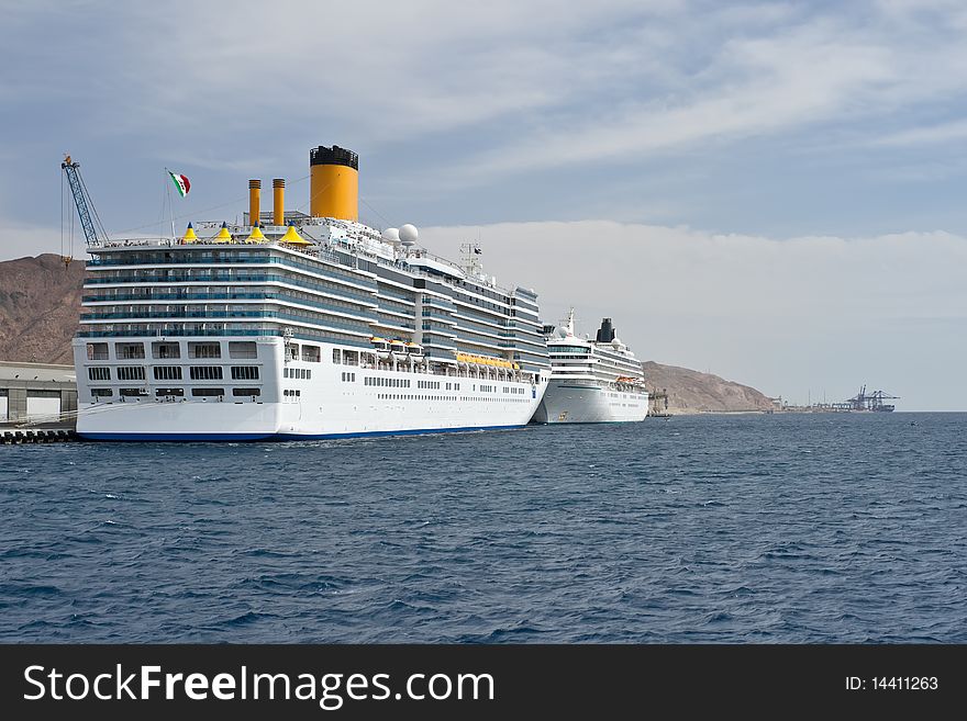 Giant cruise ships moored at a dock. Aqaba port. Jordan