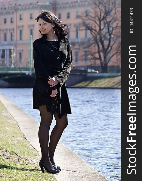 Beautiful young woman at the river channel. Beautiful young woman at the river channel