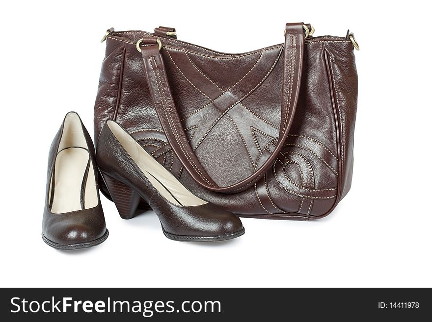 Brown shoes and bag isolated on the white background. Brown shoes and bag isolated on the white background