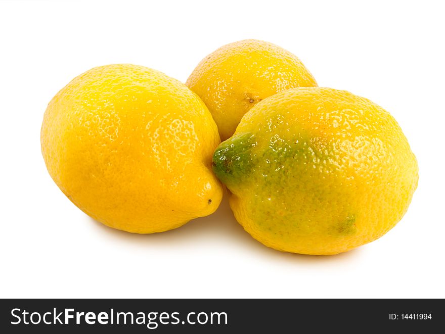 Three lemons isolated on a white