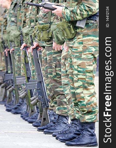 Greek solders on parade at a church festival. Greek solders on parade at a church festival