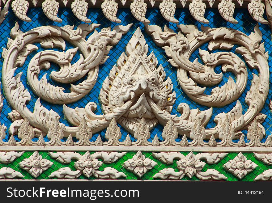 Thai style molding art with glass