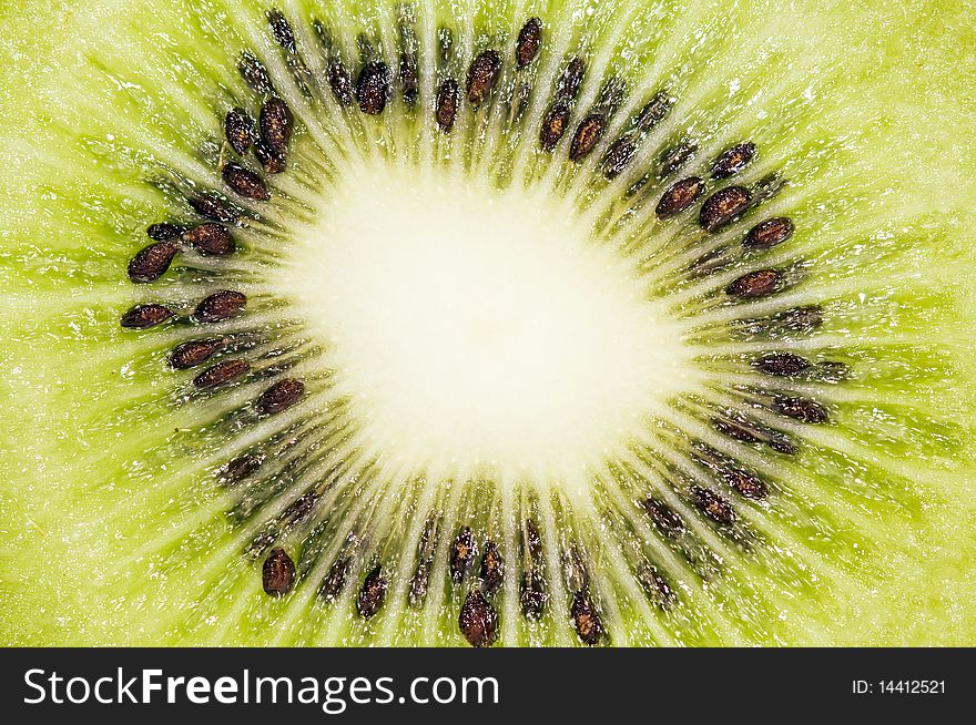 Background of the slice of fresh ripe kiwi.