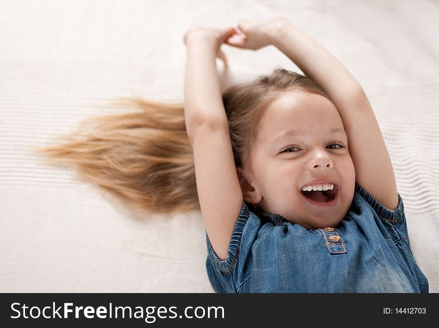 Little happy and laughing beautifull girl with long hairs. Little happy and laughing beautifull girl with long hairs.
