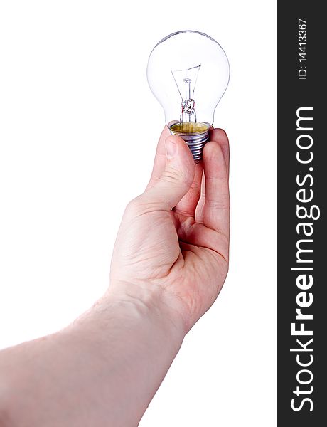 Light bulb in hand isolated on white