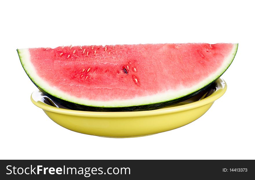 Watermelon on plate isolated on white