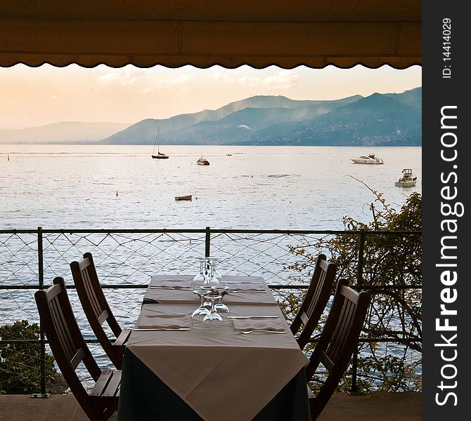Romantic table in a restaurant of Italian Riviera Paradise Gulf