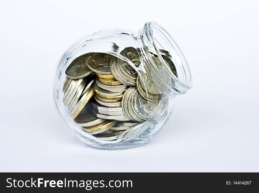 Coins in an open Jar. Coins in an open Jar.