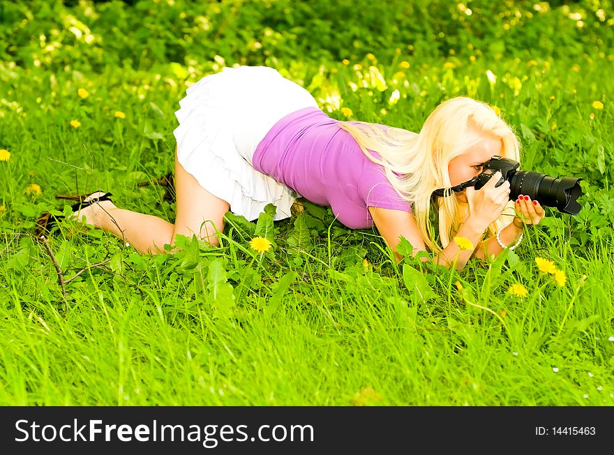 Pretty young woman in mini skirt making a picture. Pretty young woman in mini skirt making a picture