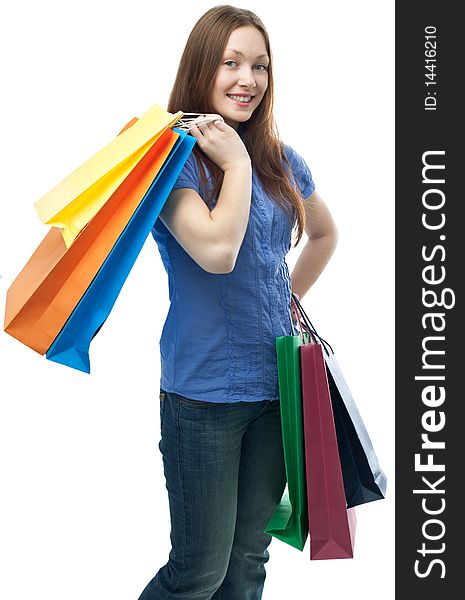 Beauty shopping woman with clored bags on white background