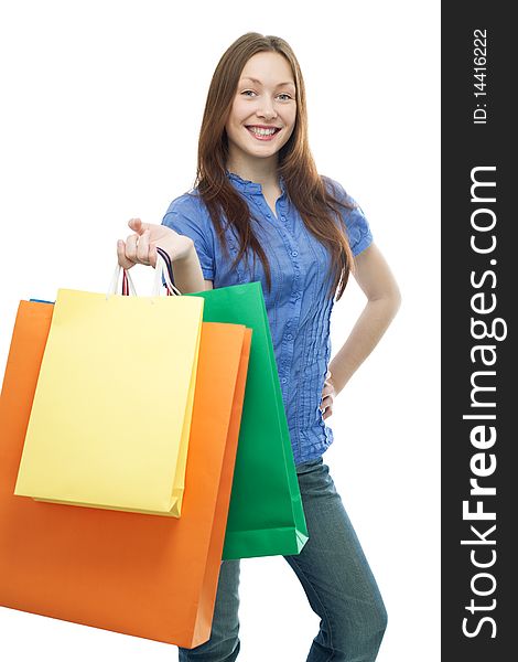 Beauty shopping woman with clored bags on white background