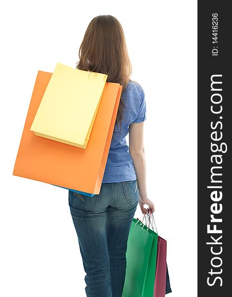 Beauty shopping woman with clored bags on white background