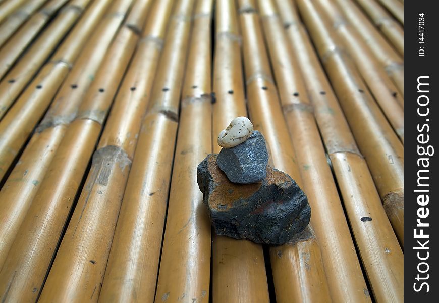 Three Zen Rock on Bamboo Background