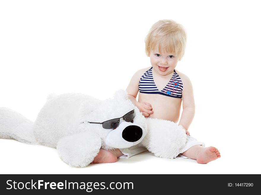 Cute baby with teddy bear getting ready for beach season isolated on white