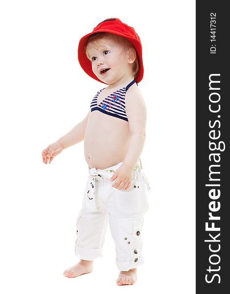 Baby girl in a swimsuit and red hat