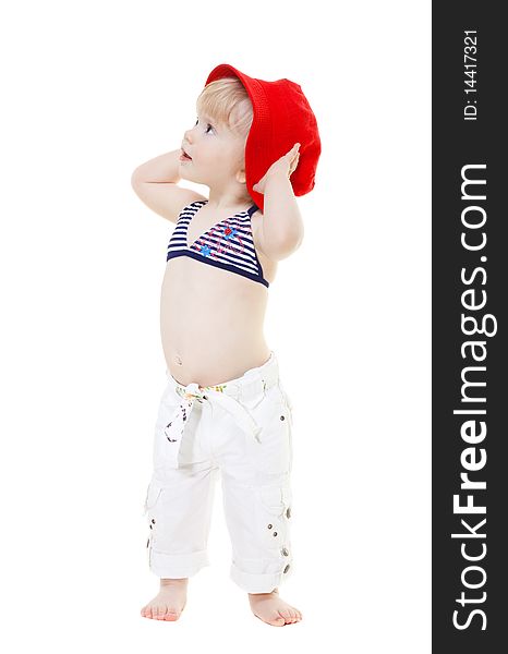Baby girl in a swimsuit and red hat isolated on white
