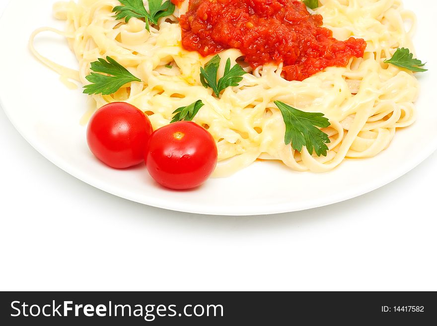 Pasta with cheese and sauce of peppers, tomatoes and garlic isolated on white