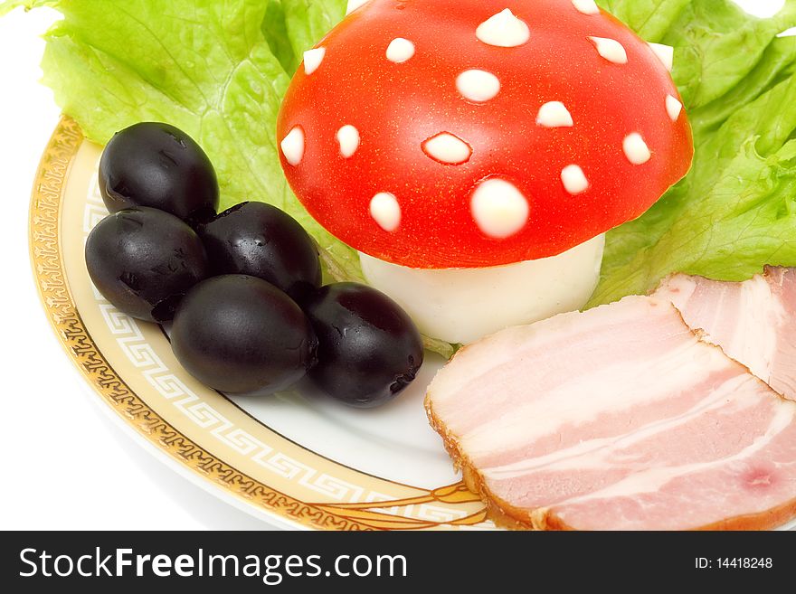 Funny food - mushroom is made from an egg, tomato and mayonnaise isolated on white