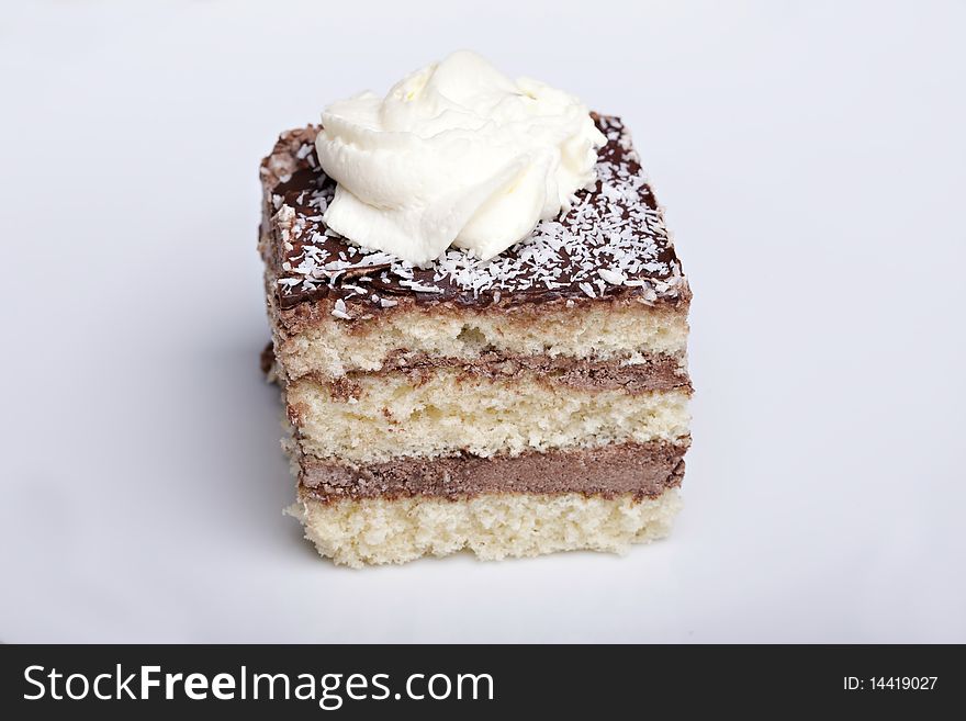 Delicious cake with whipped cream