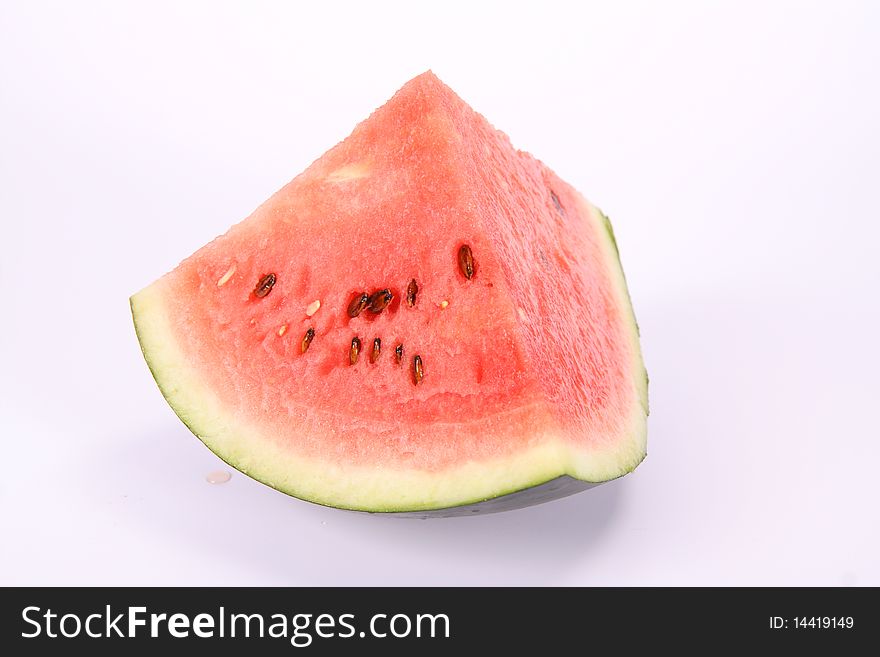 Piece of a watermelon on white background