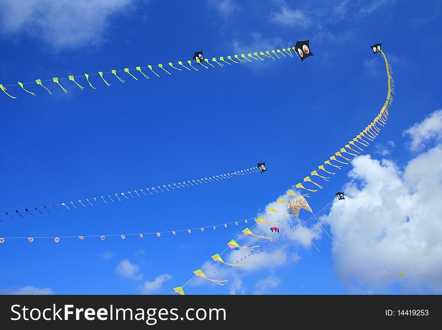 Kites flying in the blue sky. Kites flying in the blue sky