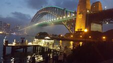 Twilight On Sydney Harbour Bridge On The Sparkling And Pristine Waters Of Sydney Harbour In Sydney, NSW, Australia Royalty Free Stock Photography