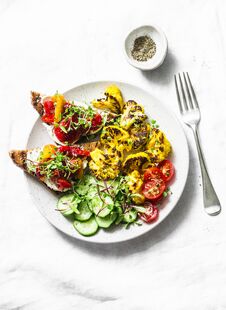Healthy Vegetarian Snacks - Turmeric Baked Cauliflower And Marinated Pepper, Goat Cheese, Wholegrain Bread Sandwiches On A Light Royalty Free Stock Photography