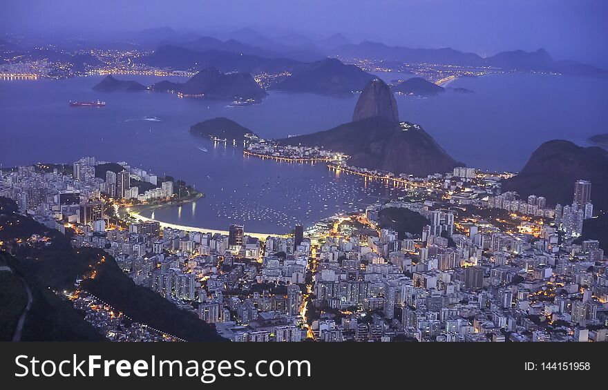 Night Shot Of Botafogo And Sugarloaf Mountai In Rio De Janeiro, Brazil