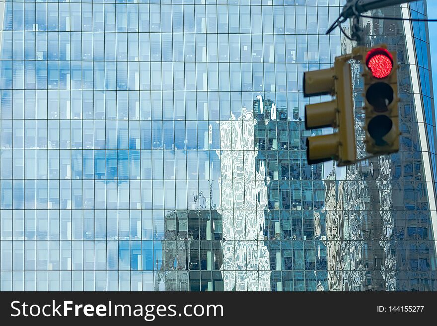 Red Light And Building With Reflection Melting Building