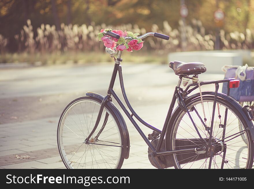 Old retro Dutch bicycle decorated with flowers