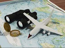 Binoculars And A Model Airplane Stock Image