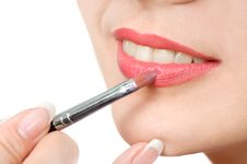 Applying Liquid Glossy Lipstick Stock Photography Applying Liquid Glossy Lipstick Stock Photography