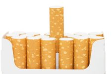 Pack Of Cigarettes With Cigarettes Sticking Out Royalty Free Stock Photos