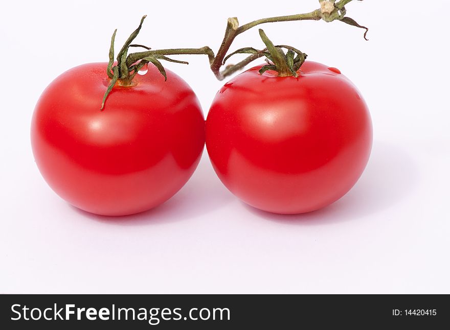 Tomato pair with attached stem