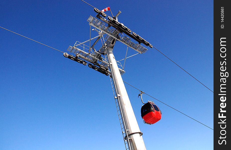 Winter landscape with a red cable car. Winter landscape with a red cable car