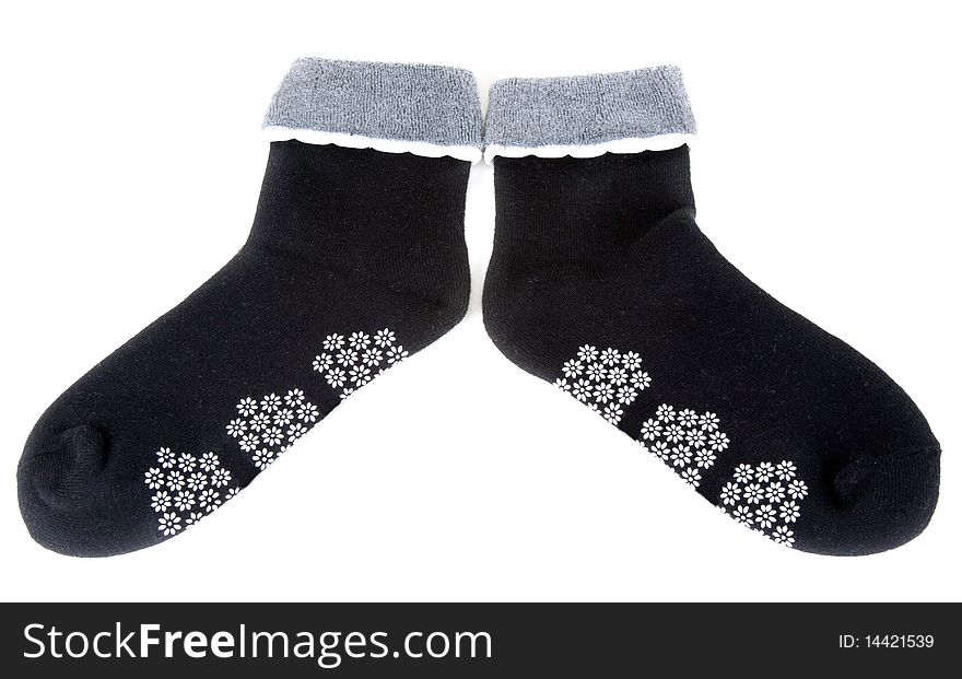 Pair warm sock with pattern in the manner of colour on white background